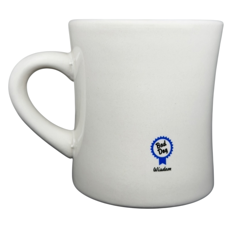 Vintage Bad Dog Wisdom Defy Authority mug with simple white design and blue logo