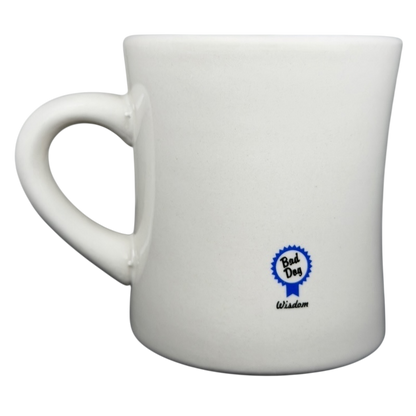 Vintage Bad Dog Wisdom Defy Authority mug with simple white design and blue logo