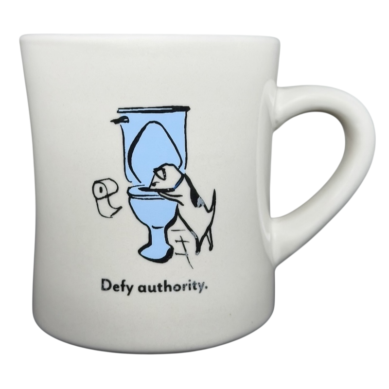 Vintage Bad Dog Wisdom Defy Authority mug featuring a playful dog near a toilet
