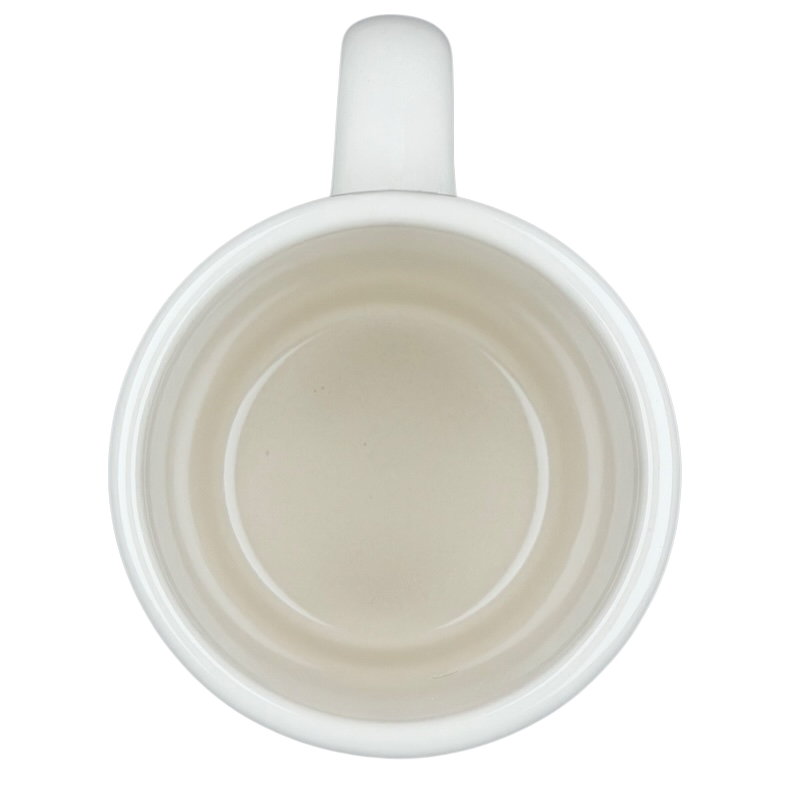 Inside view of a vintage Bad Dog Wisdom Learn To Bluff mug showcasing its smooth surface