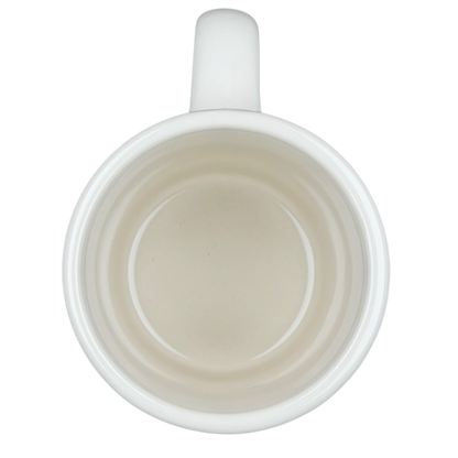 Inside view of a vintage Bad Dog Wisdom Learn To Bluff mug showcasing its smooth surface