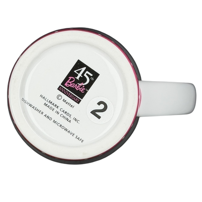 Bottom view of vintage Barbie 45th accessories mug with Hallmark branding and care instructions