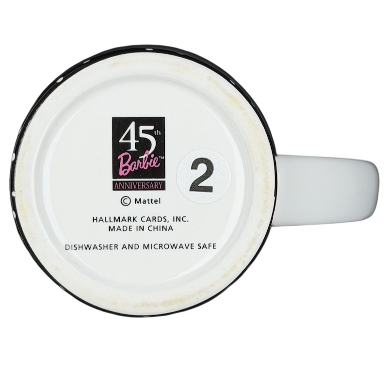 Bottom view of vintage Barbie 45th Buy The Shoes mug with dishwasher and microwave safe label