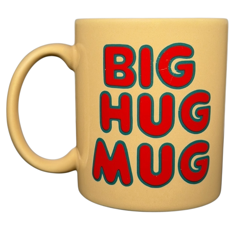 Bright yellow vintage Big Hug Mug featuring bold red lettering for a fun coffee experience