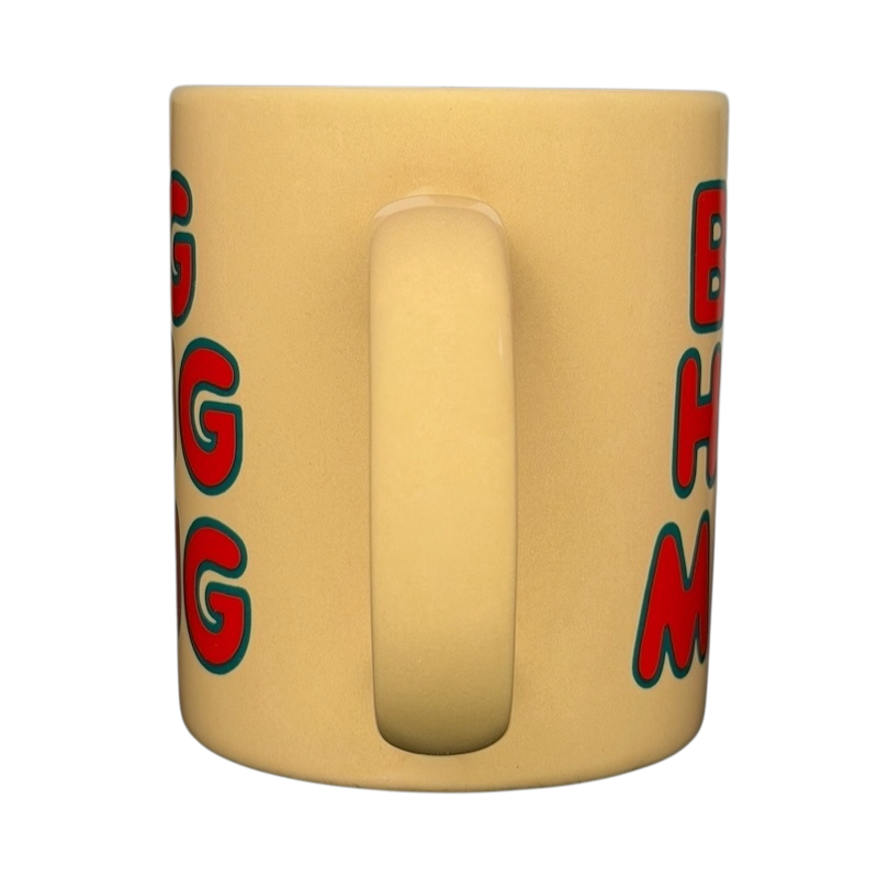 Vintage Big Hug Mug in yellow with colorful bold lettering for a cheerful coffee experience