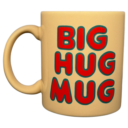 Vintage Big Hug Mug in beige with bold colorful text for a cheerful coffee experience