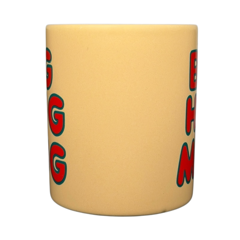 Vintage Big Hug Mug in soft yellow with colorful lettering for a cheerful beverage experience