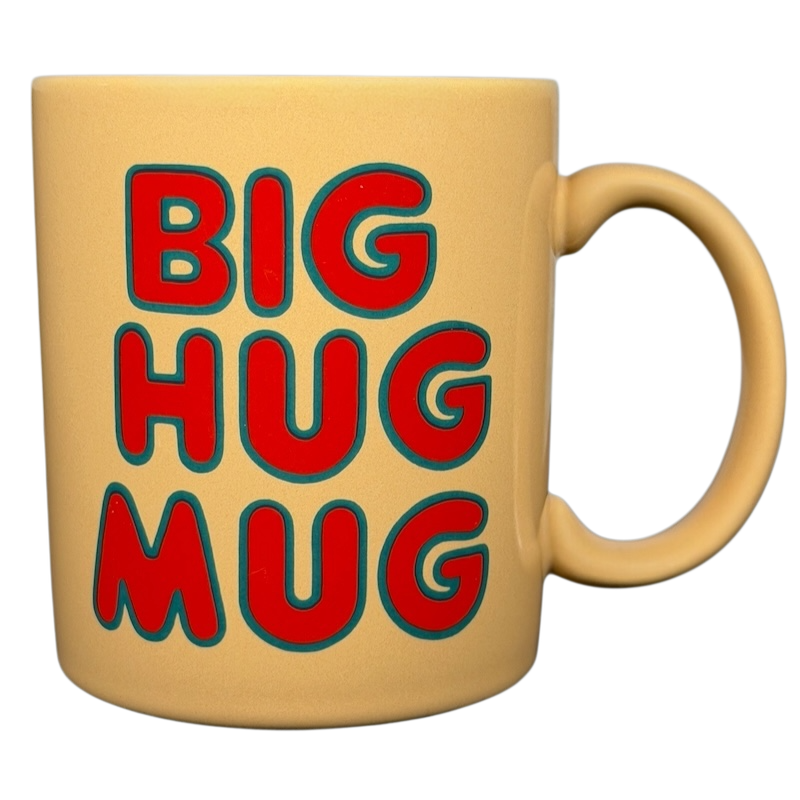 Vintage Big Hug Mug in beige with bold red and blue letters for coffee lovers