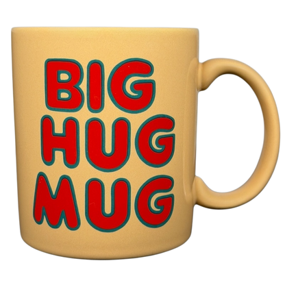 Vintage Big Hug Mug in beige with bold red and blue letters for coffee lovers