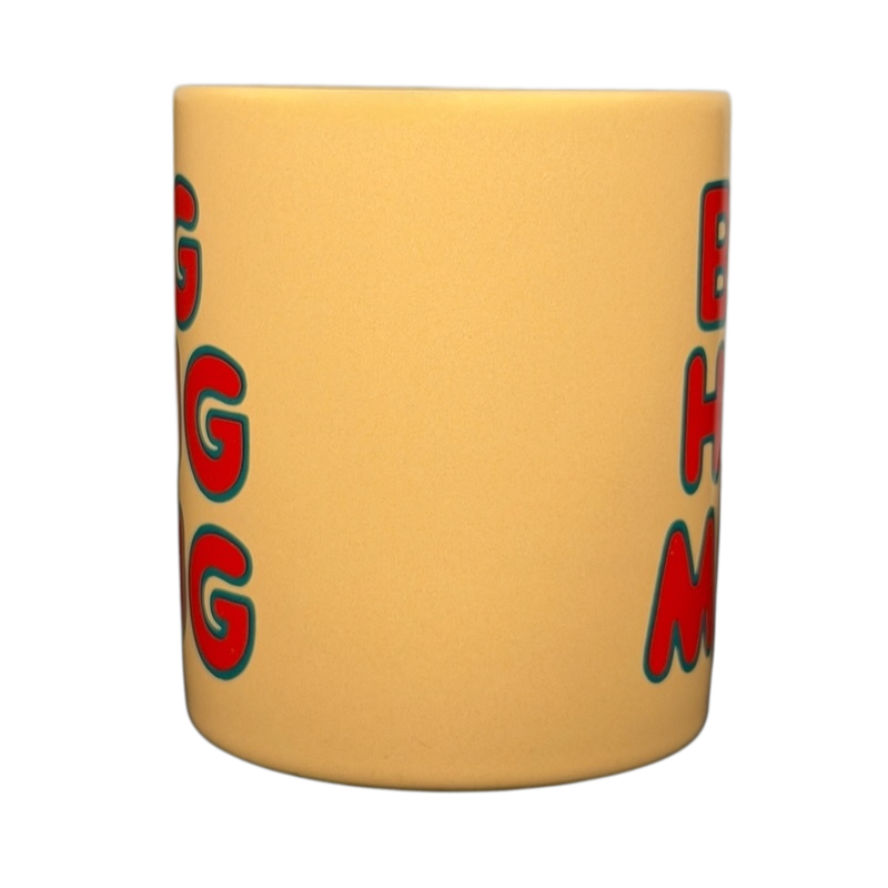 Vintage Big Hug Mug in yellow with colorful lettering, perfect for warming drinks and cozy moments