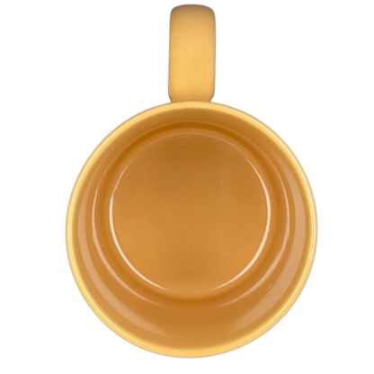 Overhead view of the vintage Big Hug Mug in warm yellow color with a smooth finish