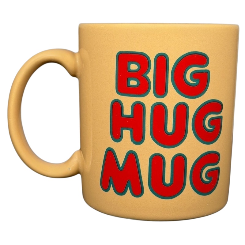 Vintage Big Hug Mug in a yellow color with bold red and green lettering