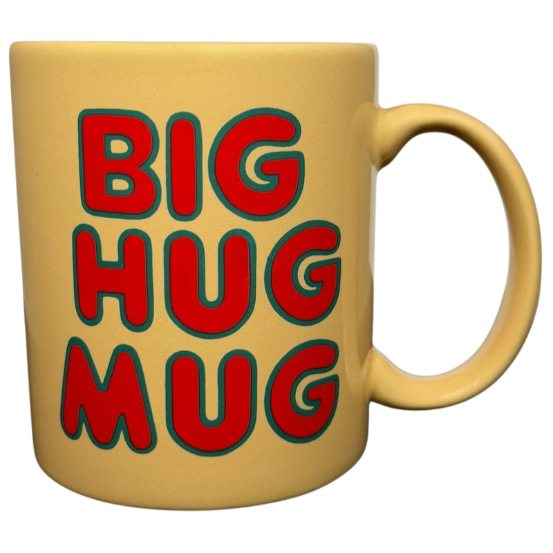 Vintage Big Hug Mug in yellow with bold red and green lettering for a cheerful drink experience