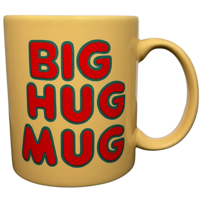 Vintage Big Hug Mug in yellow with bold red and green lettering for a cheerful drink experience