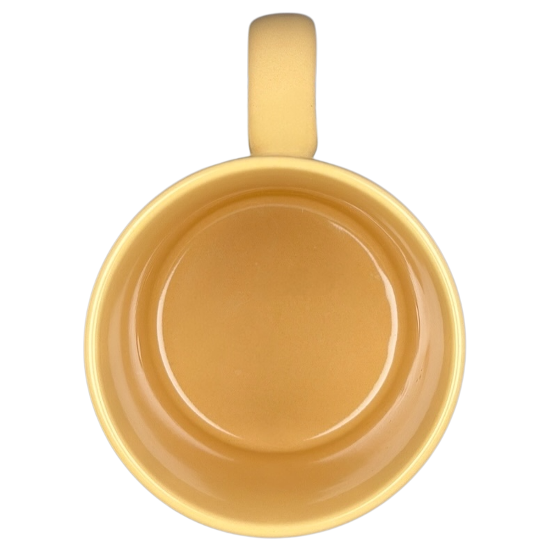Top view of a vintage Big Hug Mug in yellow, showcasing its smooth interior and comfortable handle
