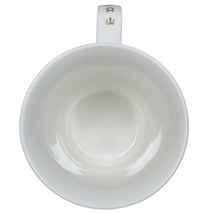 Interior view of a vintage Dunoon Leo Zodiac mug showcasing its smooth white ceramic design