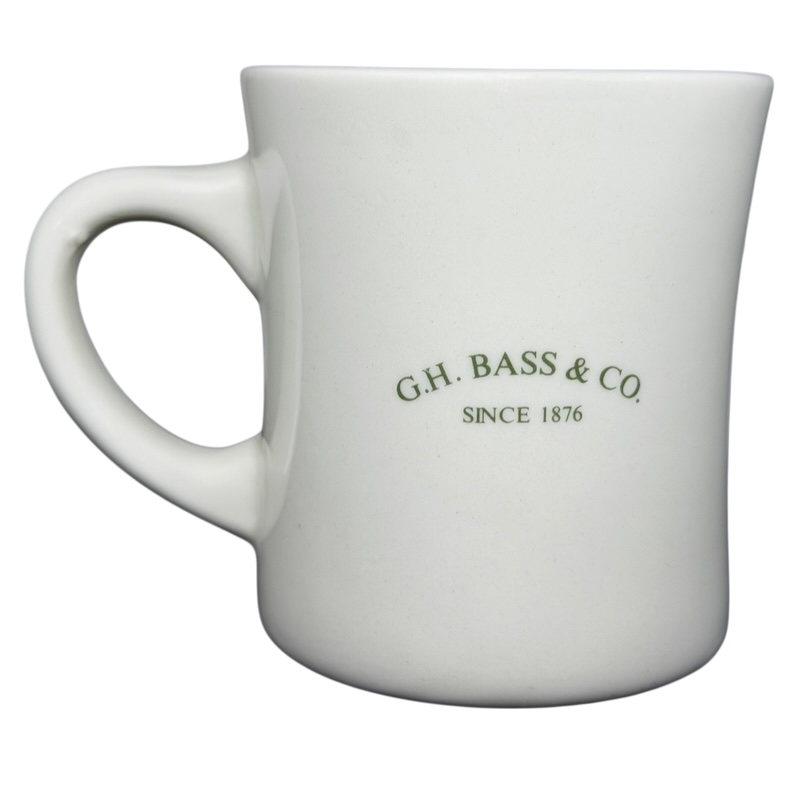Vintage G.H. Bass canoe coffee mug featuring a classic design and green logo print