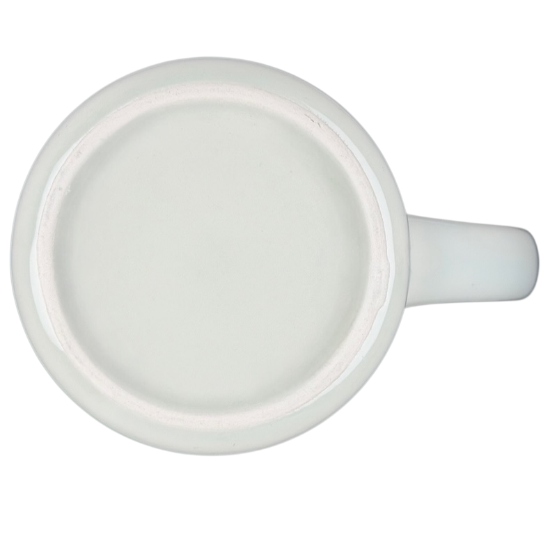 Bottom view of a vintage G.H. Bass canoe coffee mug showing smooth ceramic finish