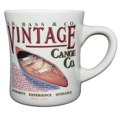 Vintage G.H. Bass canoe coffee mug featuring a classic canoe illustration and bold text design