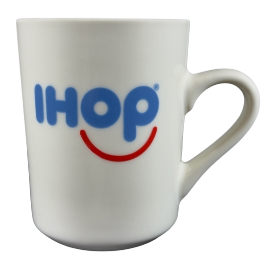 Tuxton vintage IHOP smiley mug in white with blue IHOP logo and red smile design