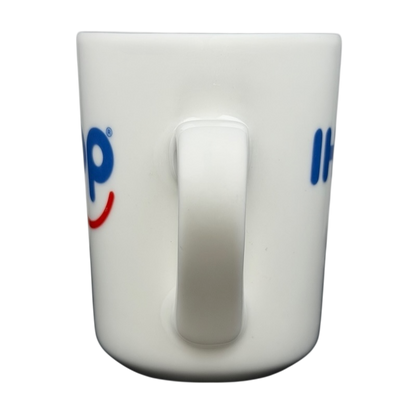 Tuxton vintage IHOP smiley mug featuring a classic white design with cheerful logo
