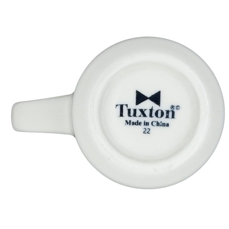 Bottom view of Tuxton vintage IHOP smiley mug showcasing the logo and quality design