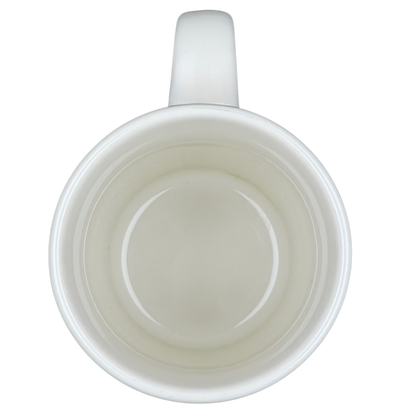 Top view of a vintage IHOP smiley mug featuring a simple white design for coffee lovers