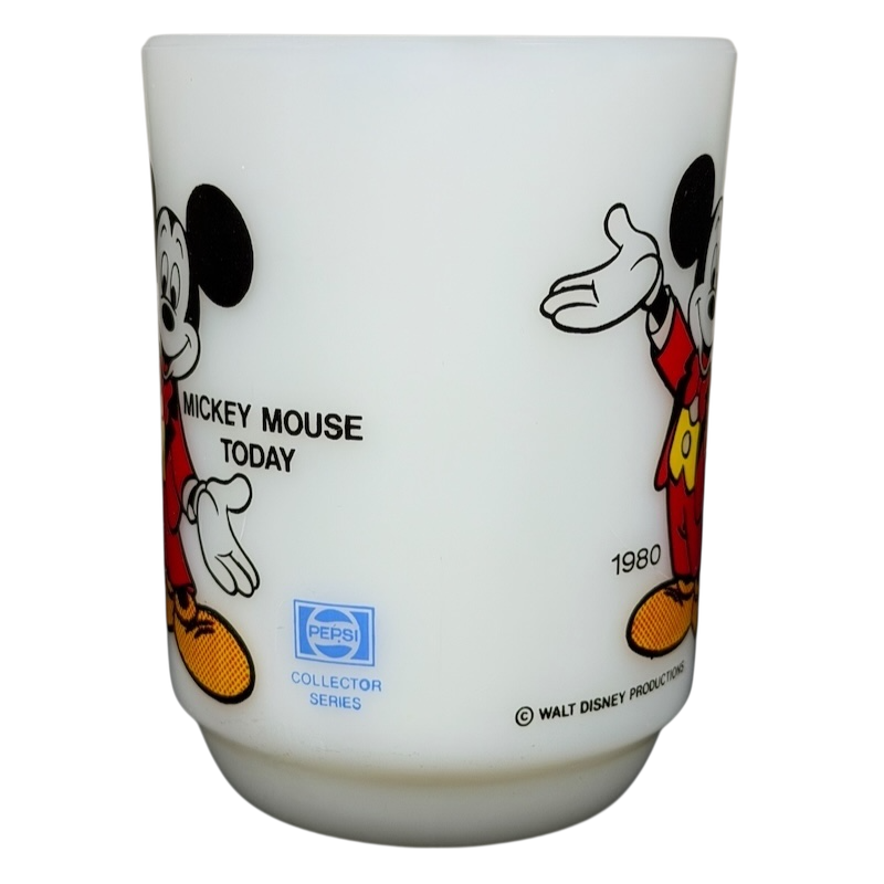 Vintage Mickey Mouse Pepsi milk glass mug featuring Mickey Mouse holding a sign from 1980