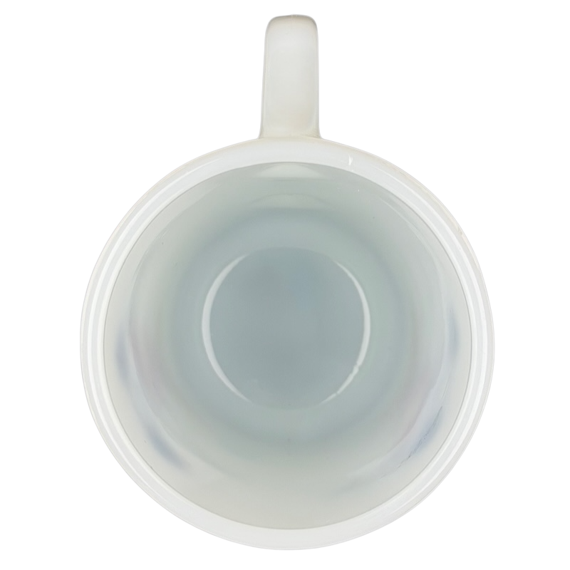 Interior view of a vintage Mickey Mouse Pepsi milk glass mug with a smooth finish