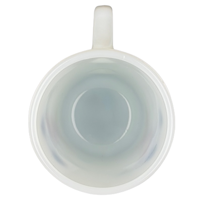 Interior view of a vintage Mickey Mouse Pepsi milk glass mug with a smooth finish