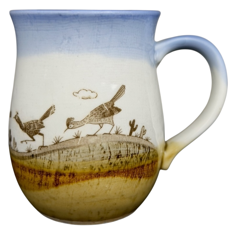 Vintage Otagiri roadrunner mug featuring colorful desert scene and textured surface