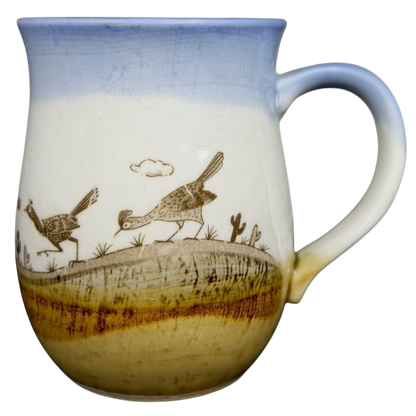 Vintage Otagiri roadrunner mug featuring colorful desert scene and textured surface