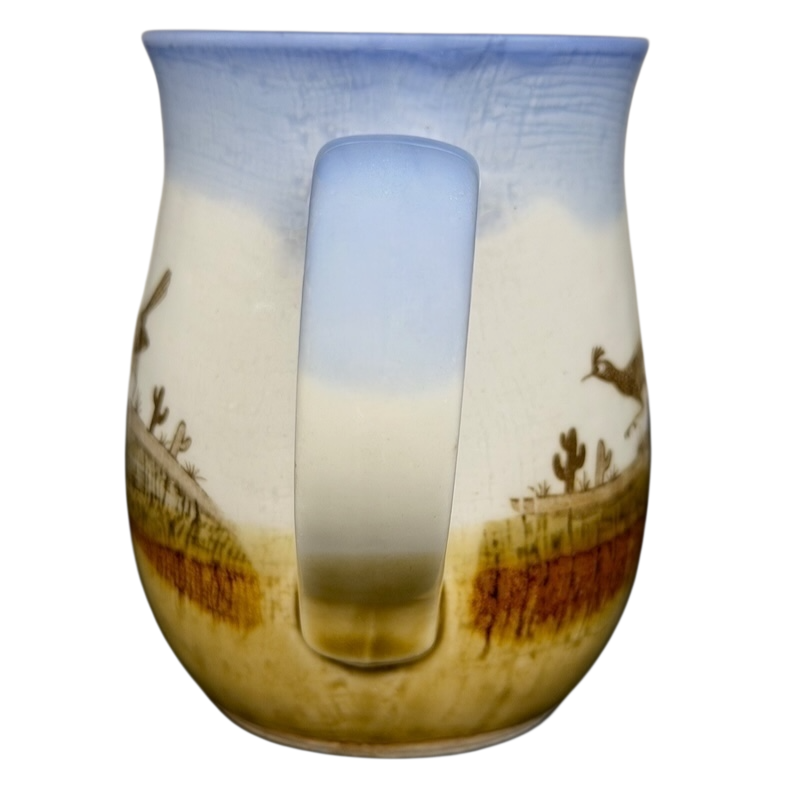 Vintage Otagiri roadrunner mug featuring a desert landscape with cacti and a blue sky