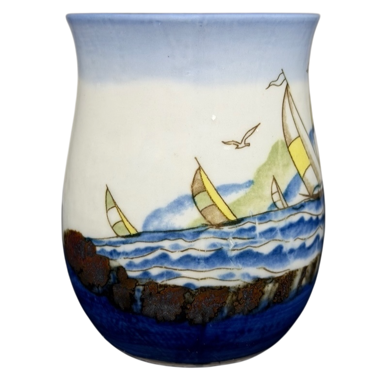 Vintage Otagiri sailboat mug featuring colorful sailboats on a blue ocean and scenic backdrop