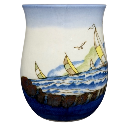 Vintage Otagiri sailboat mug featuring colorful sailboats on a blue ocean and scenic backdrop