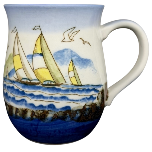 Vintage Otagiri sailboat mug featuring colorful sailboats on a blue ocean design
