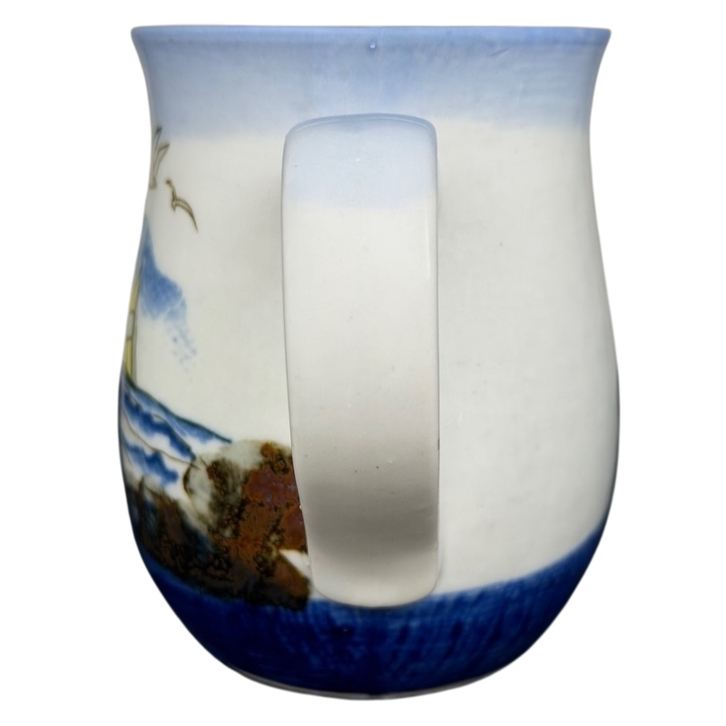 Vintage Otagiri sailboat mug featuring a scenic coastal design and a sturdy handle