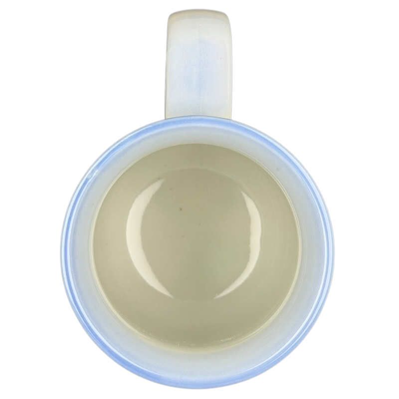 Vintage Otagiri sailboat mug with a smooth blue rim and cream interior design