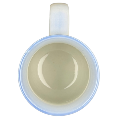 Vintage Otagiri sailboat mug with a smooth blue rim and cream interior design