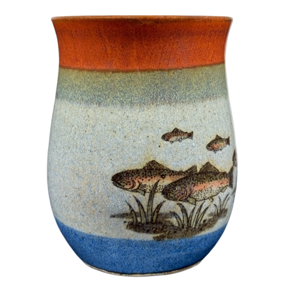 Vintage Otagiri trout tankard mug featuring colorful fish designs and textured ceramic surface