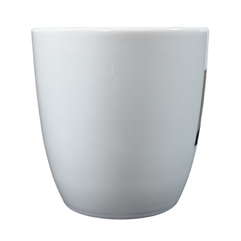 White coffee mug shown from the back with a vintage Peet's Coffee mug gold frame design on the front