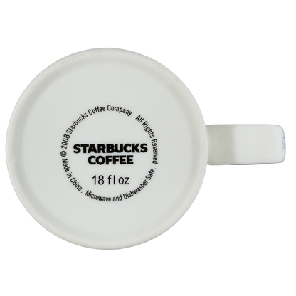 Bottom view of a vintage Pike Place Starbucks mug showcasing its 18 oz capacity and care instructions