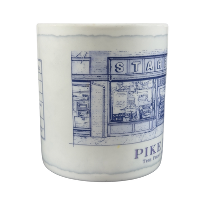 Vintage Pike Place Starbucks mug featuring an illustrated storefront design
