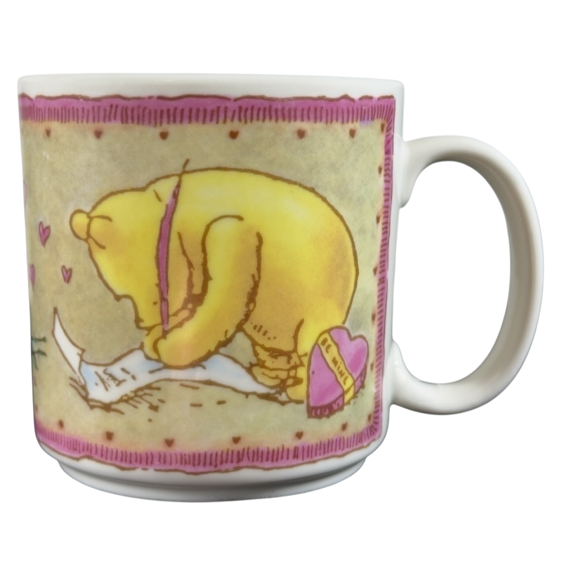 Disney vintage Winnie the Pooh Love Letter mug featuring Pooh writing with a pink feather pen