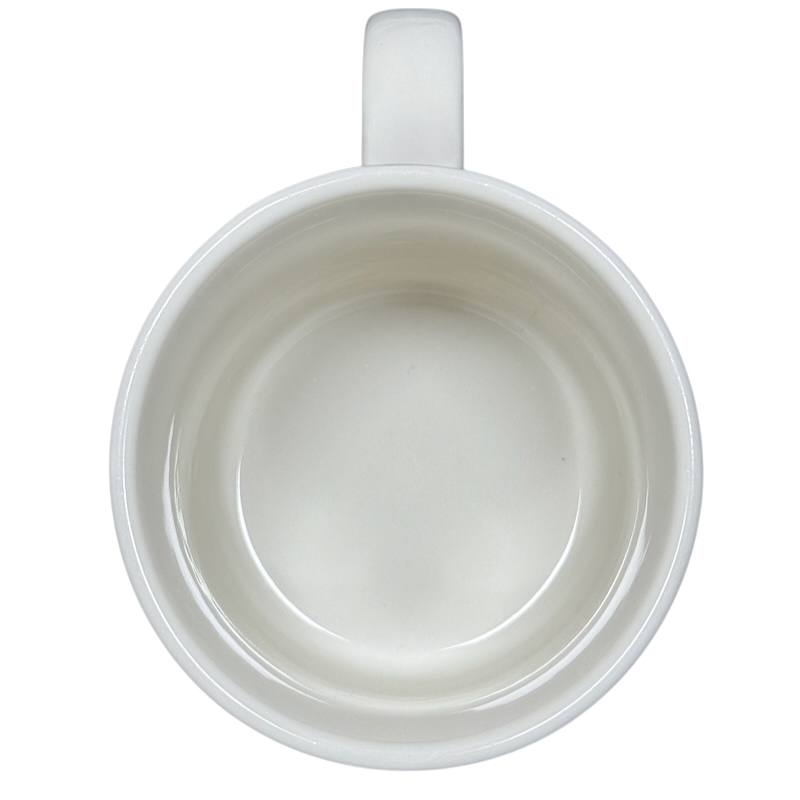 Top view of empty white ceramic vintage Winnie the Pooh Love Letter mug by Disney