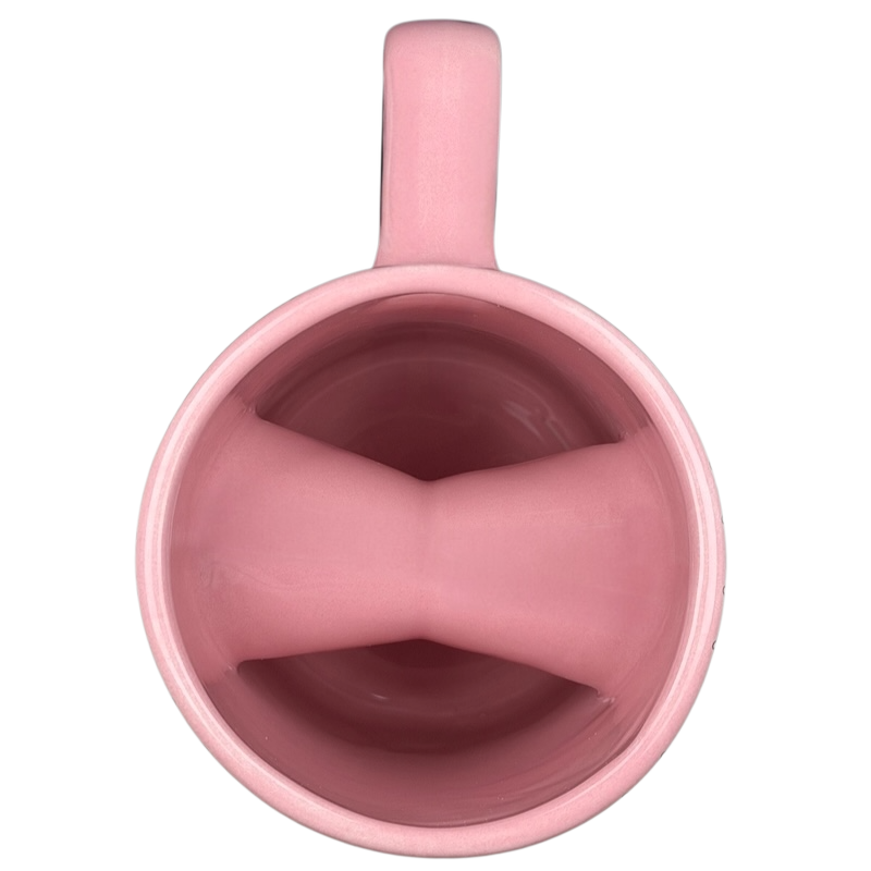 Voodoo Doughnut Universal Orlando mug in pink showcasing a smooth interior design