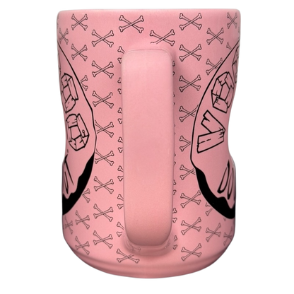 Voodoo Doughnut Universal Orlando mug in pink featuring classic logo and bone designs