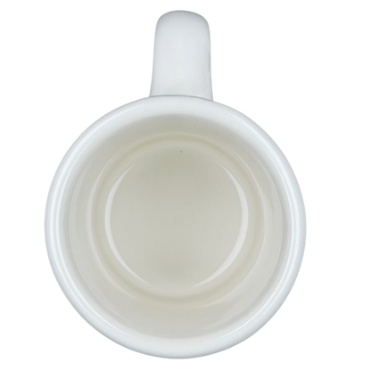 Top view of a white Tuxton ceramic Waffle House vintage coffee mug with a smooth interior