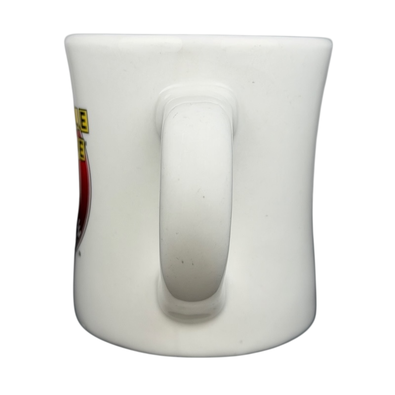 Side view of Tuxton Waffle House vintage coffee mug with smooth handle design