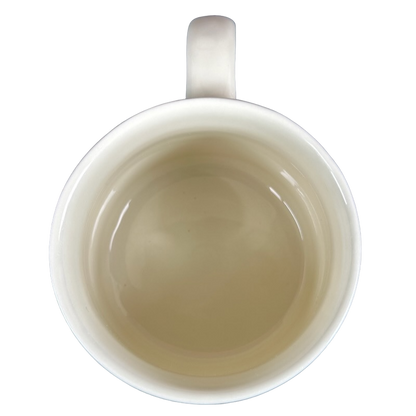 Top view of Westwood Yester Year Daily Delight vintage coffee mug empty white ceramic with handle on black background